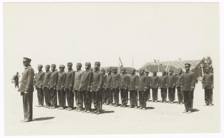Young American Indian Men in Uniforms, Standing in Formation