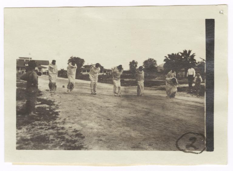American Indian Men Competing in a Sack Race