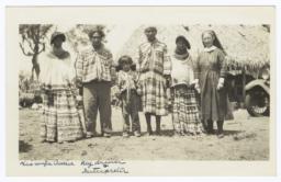 Deaconess Bedell Posing with Seminole Indians, Everglades, Florida
