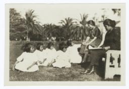 Two Women with a Group of Elementary School Girls