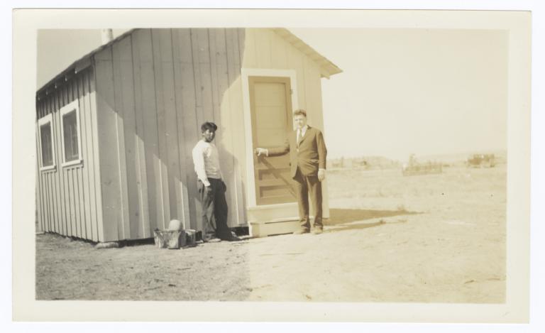Sherman and Floyd O. Burnett in front of a Cabin, Modoc County, California