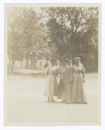 Three Women Posing for the Camera