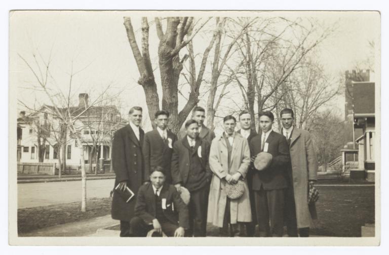 Group of  Men Standing Near Trees 