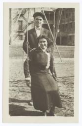 Young Couple Posed with Lady Sitting on a Swing