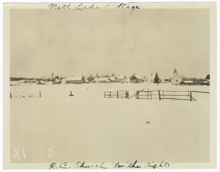 View of Nett Lake Village, Minnesota in the Winter, with a Roman Catholic Church to the Right