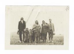 Unidentified Man Posing with American Indian Family