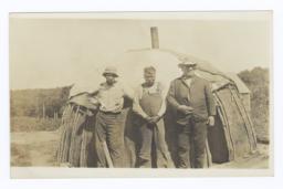 Three Men in front of Wickiup
