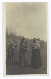 Two American Indian Women, a Girl and Three Babies