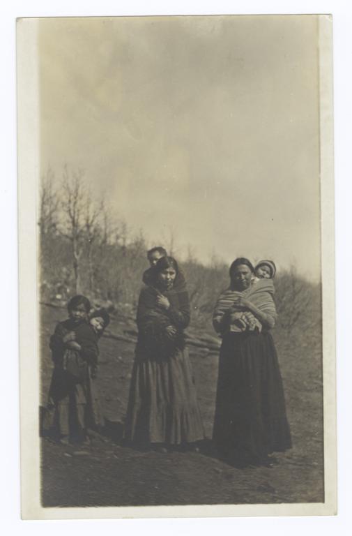 Two American Indian Women, a Girl and Three Babies