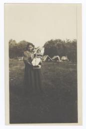 Young American Indian Woman with Baby in Cradle Board