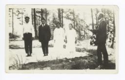 Outdoor Wedding of Two Mescalero Couples, Overman (Missionary) Officiating