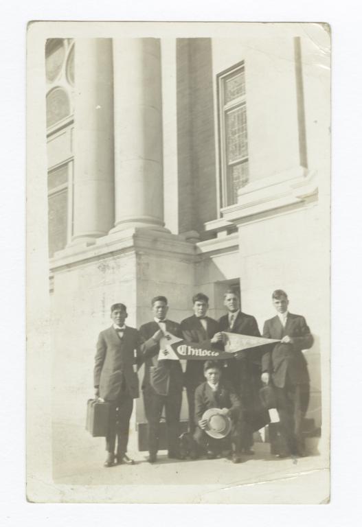 Young Men in Suits Holding Chilocco Indian School and YMCA Pennants  