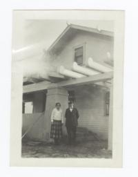 Man and Woman Posing in front of Building, Creek, Oklahoma 