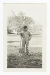 American Indian Boy with Shovel