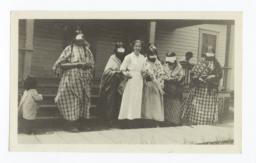 Nurse and American Indian Women with Bandaged Eyes