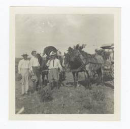 G.E.E. Lindquist with Three Men and Horse Carriages