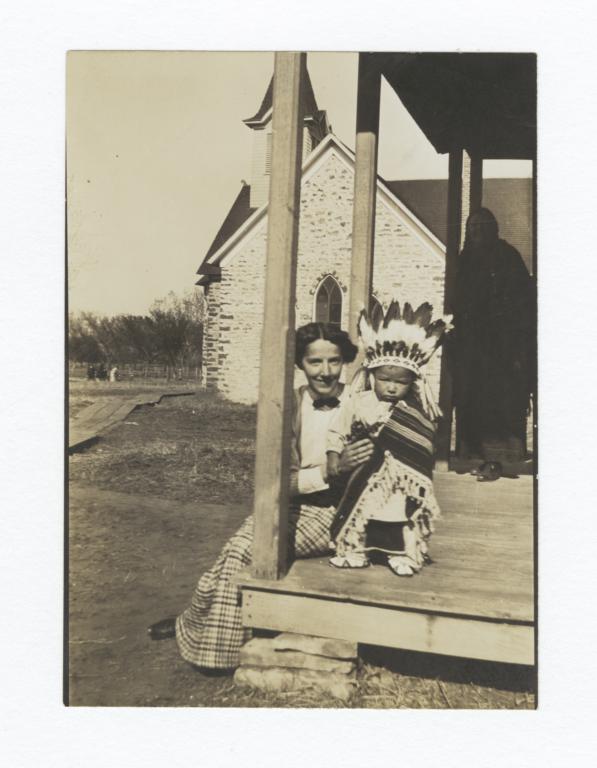 Woman with American Indian Child in Traditional Dress, Mother in Shadows behind 