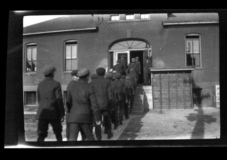 Group of Men Entering a Building, Rapid City, South Dakota