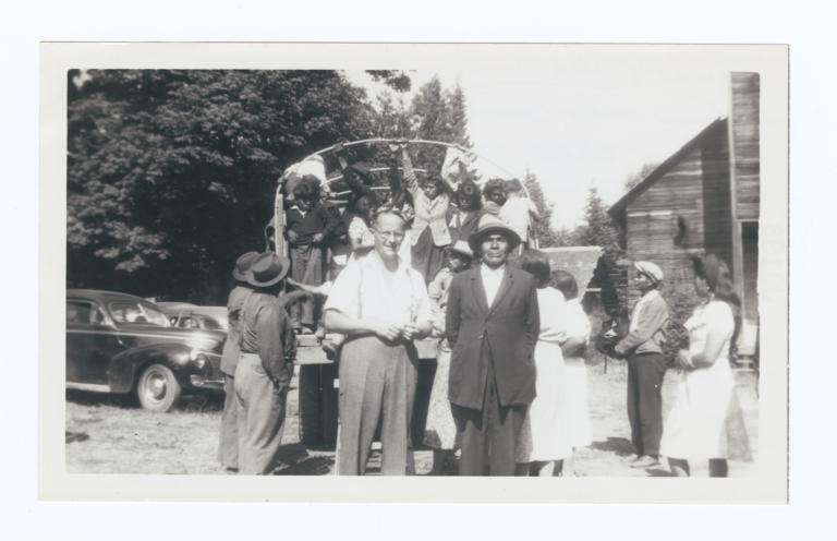 Missionary and Chief Paul Dick Standing together with Canadian Indians in Background, Puget Sound