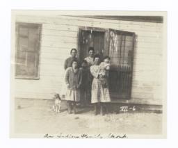 American Indian Family in front of Their House