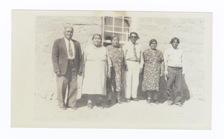 Six Native Americans in front of Adobe House
