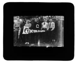 Group of Men Displaying "Chemawa" Pennants