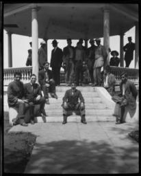 Large Group of Men Posing in and around the Gazebo