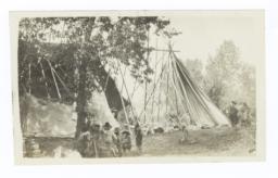 Semi-Covered Tipis with Kalispel Indian Adults and Children
