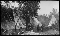 Semi-Covered Tipis with Kalispel Indian Adults and Children, Idaho