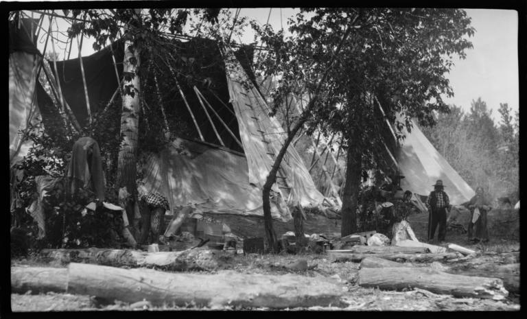 Semi-Covered Tipis with Indian Adults and Children, Idaho