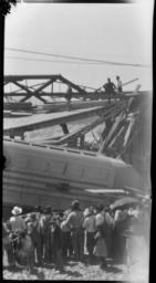 Crowds Looking at a Bridge Accident 