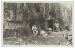 Mexican Indians Sitting outside a Shack