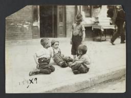 Boys Playing on Sidewalk