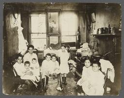 Mother with Eight Children in Tenement Kitchen