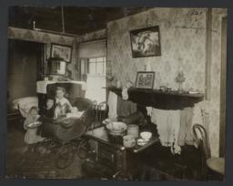Four Children in a Tenement Room