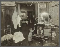 Two Children in Tenement Rooms