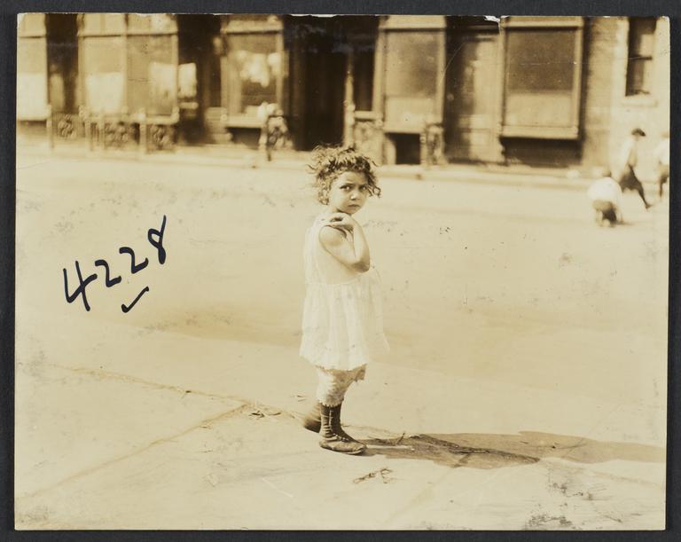 Little Girl on Sidewalk