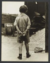 Boy With Hands Behind his Back