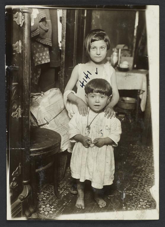 Barefoot Child with Sister
