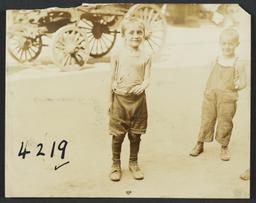 Two Boys, Buggy in Background