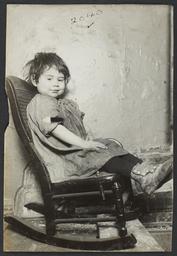 Little Girl in Rocking Chair