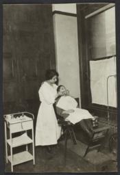 Mulberry Health Center Album -- Dental Hygienist with Girl