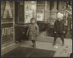 Two Children near Grate
