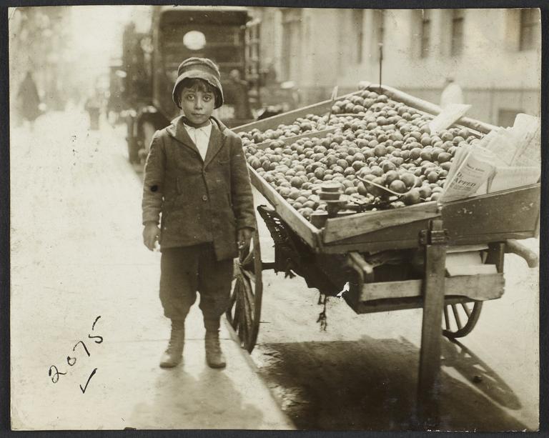 Boy near Fruit Stand