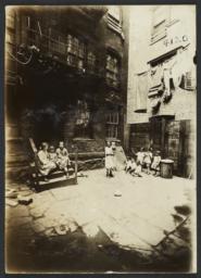 Children Between Buildings
