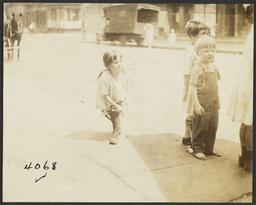 Children on Sidewalk, Horse in Background