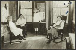 Two Women and Two Girls in Room