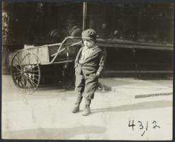 Boy in Front of Bread Shop