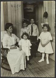 Seated Woman with Four Standing Children