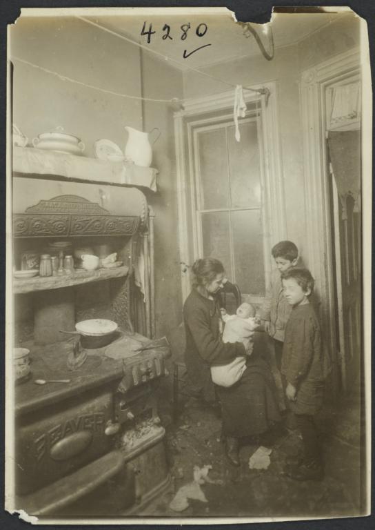 Family with Crying Baby in Kitchen